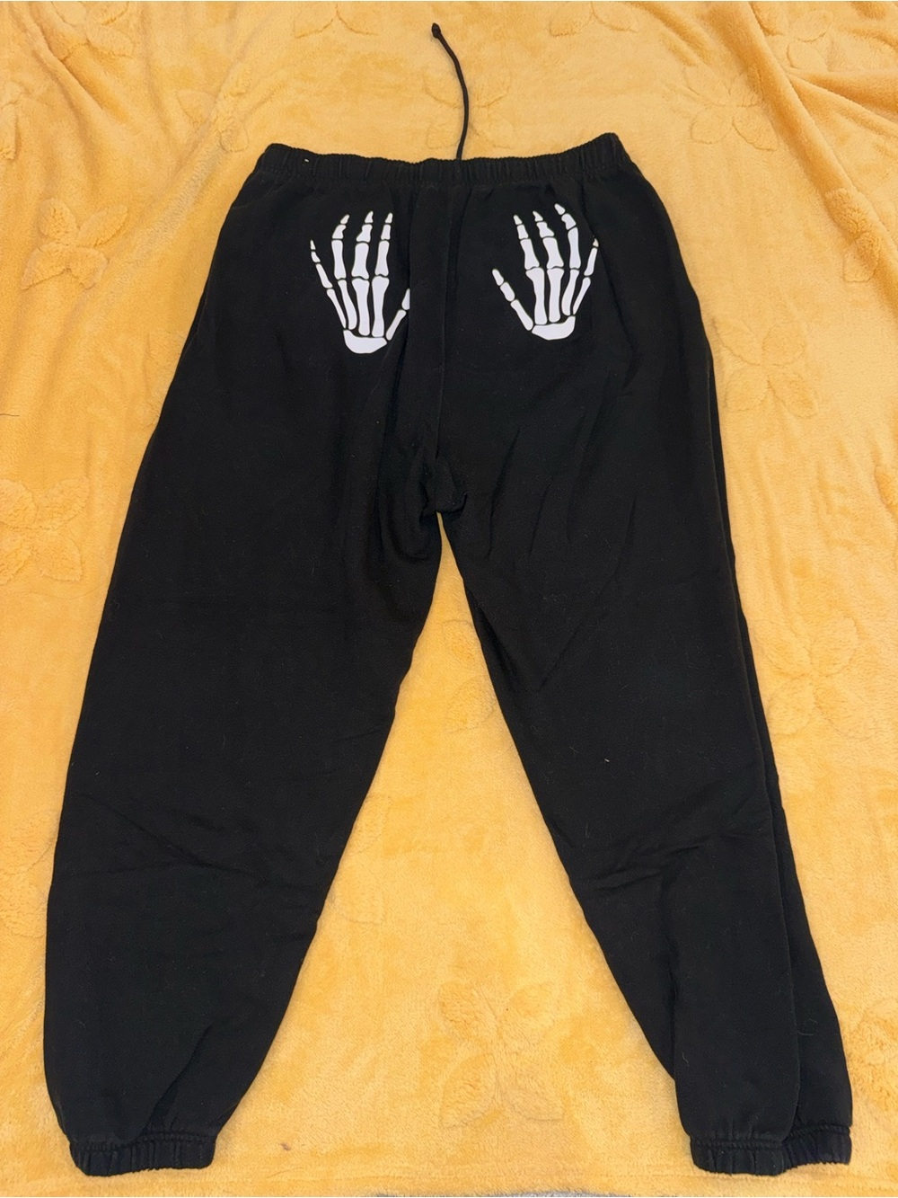 PINK Victoria's Secret Black Joggers with White Skeleton Hand Graphic